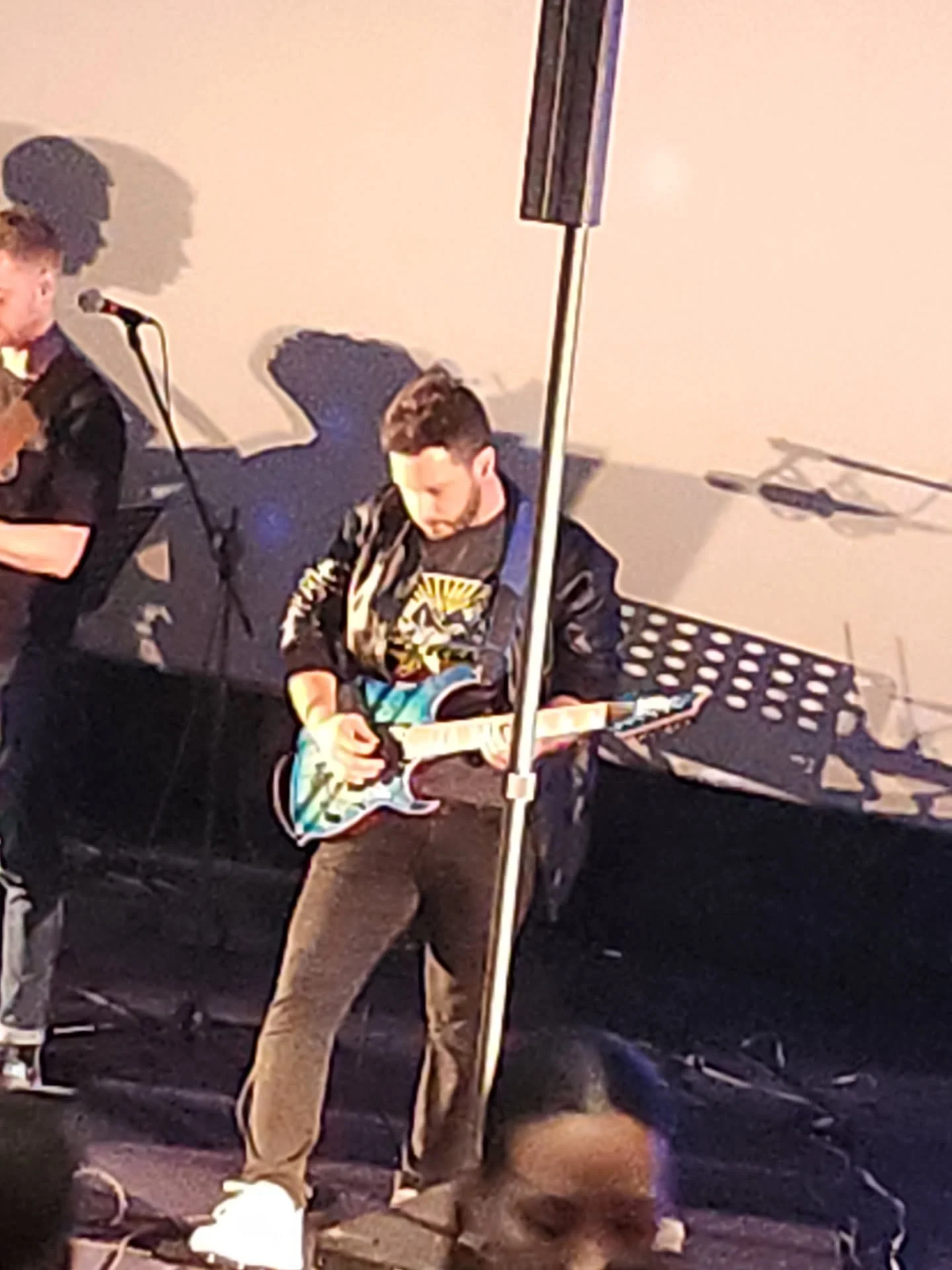 Playing guitar on stage